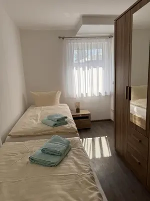 Ein Bett oder Betten in einem Zimmer der Unterkunft Ferienhaus Barbarine