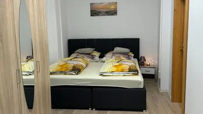 Ein Bett oder Betten in einem Zimmer der Unterkunft Pension Arthur