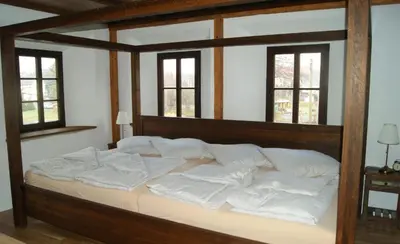 Ein Bett oder Betten in einem Zimmer der Unterkunft Große Ferienwohnung - Monteurswohnung bei Dresden