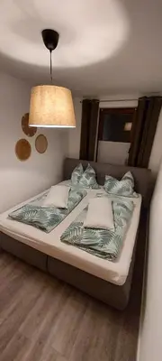 Ein Bett oder Betten in einem Zimmer der Unterkunft Apartment-Chemnitz