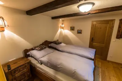 Ein Bett oder Betten in einem Zimmer der Unterkunft Ferienhaus Kraxlhütte Krippen