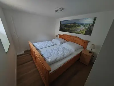 Ein Bett oder Betten in einem Zimmer der Unterkunft Ferienhaus Anno 1794 Pirna