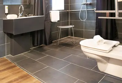 Ein Badezimmer in der Unterkunft FG Hotel by WMM Hotels