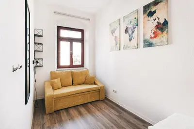 Ein Sitzbereich in der Unterkunft Homely Apartments Großzügige 75qm Zentral & Gratis-Parkplatz