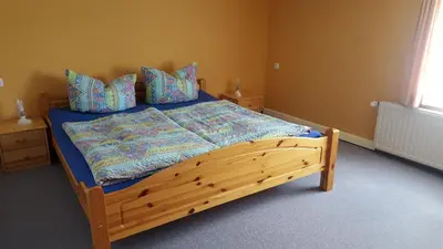 Ein Bett oder Betten in einem Zimmer der Unterkunft Haus Elbtalblick