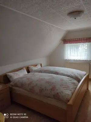 Ein Bett oder Betten in einem Zimmer der Unterkunft Ferienhaus Pali - idyllische Atmosphäre