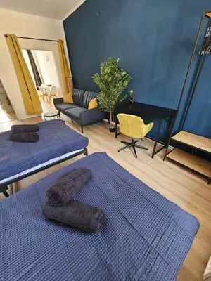 Ein Bett oder Betten in einem Zimmer der Unterkunft Moderne Ferienwohnung in unmittelbarer Nähe zum Schloss