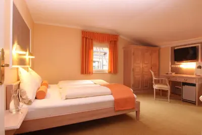 Ein Bett oder Betten in einem Zimmer der Unterkunft Rabenauer Mühle 