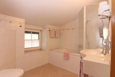 Ein Badezimmer in der Unterkunft Rabenauer Mühle 