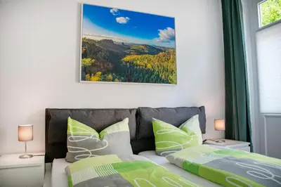 Ein Bett oder Betten in einem Zimmer der Unterkunft Haus Wettin