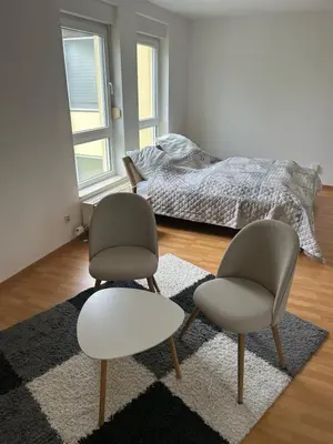 Ein Bett oder Betten in einem Zimmer der Unterkunft Schöne Wohnung für Tagesgäste, Studenten oder Handwerker, Chemnitz Gablenz, ÖPNV direkt vor der Tür, Internet & TV inkl