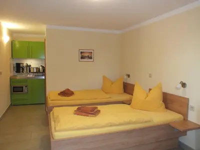 Ein Bett oder Betten in einem Zimmer der Unterkunft Ferienobjekt beim Steinmetzen