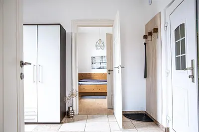 Ein Bett oder Betten in einem Zimmer der Unterkunft Haus Felix Radebeul Spitzhausblick 1 OG