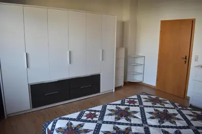Ein Bett oder Betten in einem Zimmer der Unterkunft FeWo Schmetterling