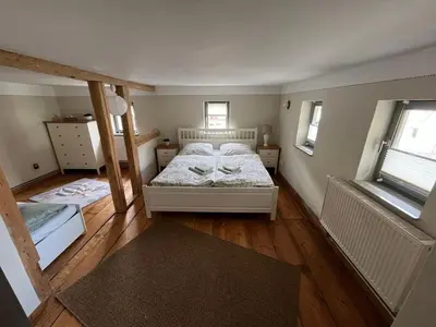 Ein Bett oder Betten in einem Zimmer der Unterkunft Ferienhaus bei Hempels