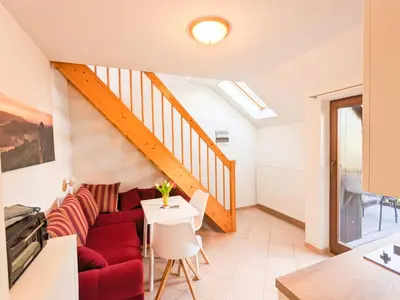 Ein Sitzbereich in der Unterkunft B7 - Urlaubsmagie Maisonette Wohnung mit Balkon