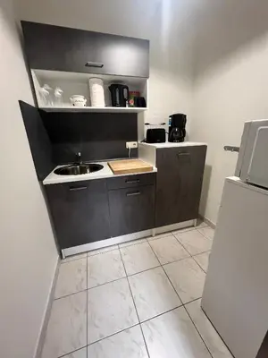 Küche/Küchenzeile in der Unterkunft Kleine moderne Ferienwohnung