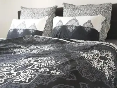Ein Bett oder Betten in einem Zimmer der Unterkunft SeenSucht & Urlaubsträume, Ferienwohnung 