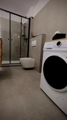 Ein Badezimmer in der Unterkunft StayFine - smartes Design Apartment am Uni Campus