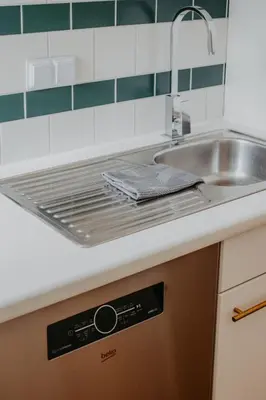 Küche/Küchenzeile in der Unterkunft Zentrumsnah, Balkon, 2 Smart TV, schnelles WiFi