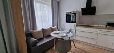 Küche/Küchenzeile in der Unterkunft Zentrum Apartment - OLED TV - PS4 - Balkon - Parking