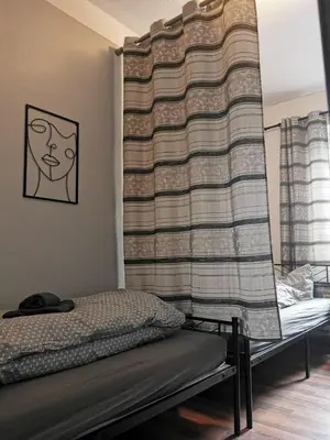 Ein Bett oder Betten in einem Zimmer der Unterkunft SaxonyBNB