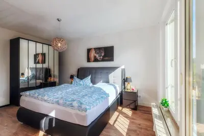 Ein Bett oder Betten in einem Zimmer der Unterkunft QuartierDresden zentral-elbnah-ruhig-familienfeundlich-ÖPNV
