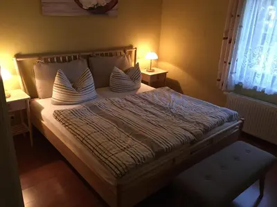 Ein Bett oder Betten in einem Zimmer der Unterkunft Ferienwohnung Gisela Kästner Stolpen