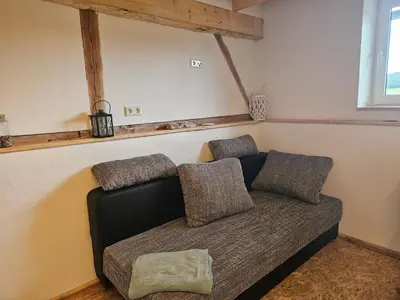 Ein Sitzbereich in der Unterkunft Unterkunft , Ferienwohnung auf dem Land, Monteurswohnung