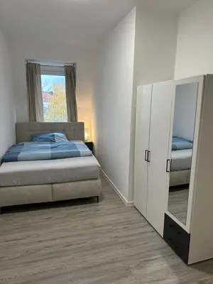 Ein Bett oder Betten in einem Zimmer der Unterkunft Linda Ninh Apartment