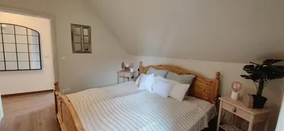 Ein Bett oder Betten in einem Zimmer der Unterkunft Villa Wundervoll