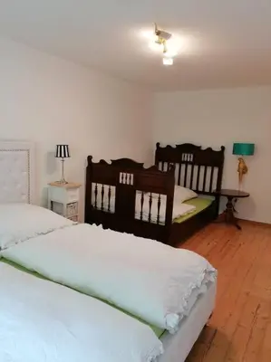 Ein Bett oder Betten in einem Zimmer der Unterkunft Bergglück