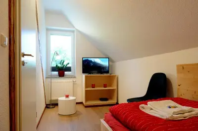 Ein Bett oder Betten in einem Zimmer der Unterkunft Lausitzer Ferienapartment Stube