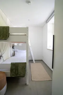 Ein Bett oder Betten in einem Zimmer der Unterkunft Oase am Tierpark exklusiv und gehobener Standard