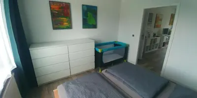 Ein Bett oder Betten in einem Zimmer der Unterkunft F2 - Am alten Elbarm - Laubegast