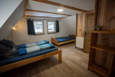 Ein Bett oder Betten in einem Zimmer der Unterkunft Rathewalder Mühle