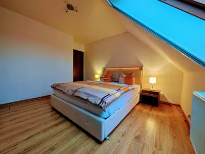 Ein Bett oder Betten in einem Zimmer der Unterkunft Schöne 2-Raumwohnung inklusive Infrarot-Wärmekabine