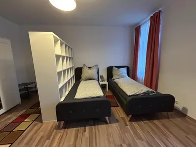 Ein Bett oder Betten in einem Zimmer der Unterkunft Gablenz Apartments II, ideal für 4 Personen