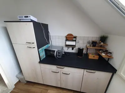 Küche/Küchenzeile in der Unterkunft Gästewohnung Elbblick - Reinkommen, Wohlfühlen und den Ausblick genießen