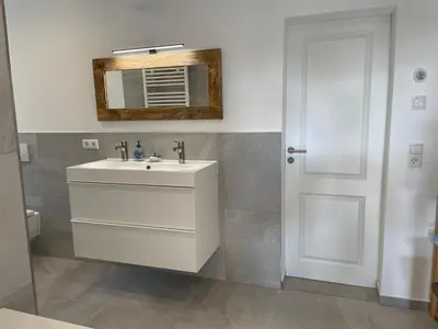 Ein Badezimmer in der Unterkunft Niemtscher Lodge am See