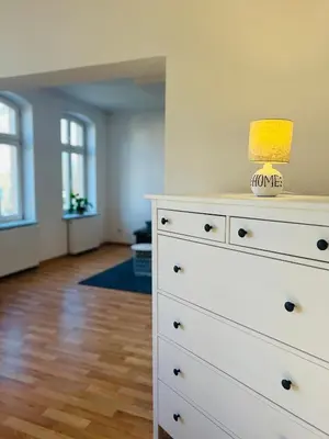 Ein Bett oder Betten in einem Zimmer der Unterkunft Komfortable Ferienwohnung im Stadtzentrum und Seenähe