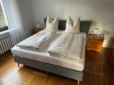 Ein Bett oder Betten in einem Zimmer der Unterkunft Exclusiv im Erzgebirge
