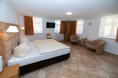 Ein Bett oder Betten in einem Zimmer der Unterkunft Pension HOFZWANZIG Dresden-Laubegast