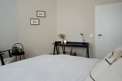 Ein Bett oder Betten in einem Zimmer der Unterkunft Sunnybelle Appartements Dresden II