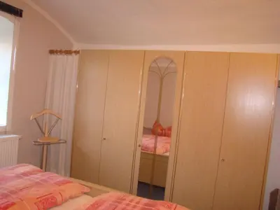 Ein Bett oder Betten in einem Zimmer der Unterkunft Ferienwohnungen Dobrahof