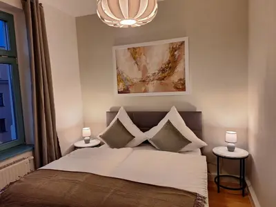 Ein Bett oder Betten in einem Zimmer der Unterkunft Schick übernachten im historischen Viertel