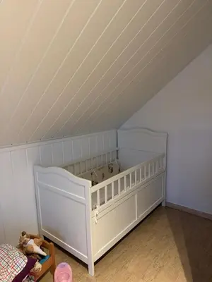 Ein Bett oder Betten in einem Zimmer der Unterkunft Einfamilienhaus unterm Dach