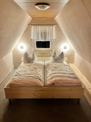 Ein Bett oder Betten in einem Zimmer der Unterkunft Ferienhaus Hentzschel
