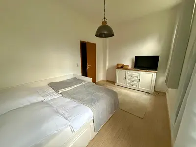 Ein Bett oder Betten in einem Zimmer der Unterkunft Komfortables 3 Zimmer Apartment in Dresden
