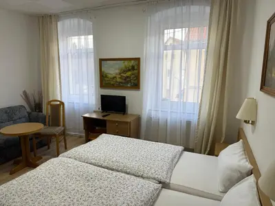 Ein Bett oder Betten in einem Zimmer der Unterkunft Landgasthof zur guten Quelle